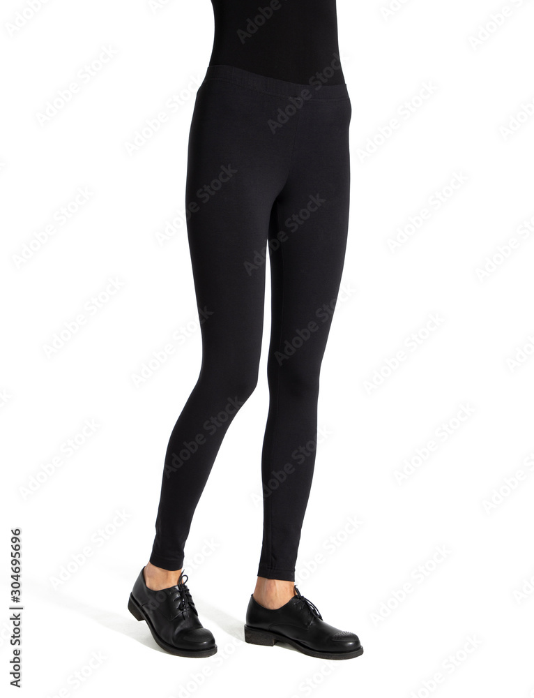 Woman wear black blank leggings mockup, isolated, clipping path. Women in clear leggins template. Cloth pants design presentation. Sport pantaloons stretch tights model wearing. Slim legs in apparel Woman wear black blank leggings mockup, isolated, clipping path. Women in clear leggins template. Cloth pants design presentation. Sport pantaloons stretch tights model wearing. Slim legs in apparel