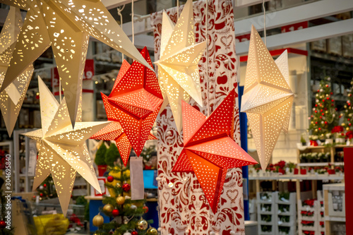 Christmas stars in shopping store.