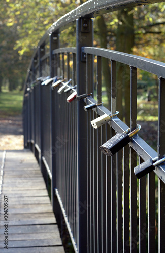 Padlocks of lovers placed on the bridge.