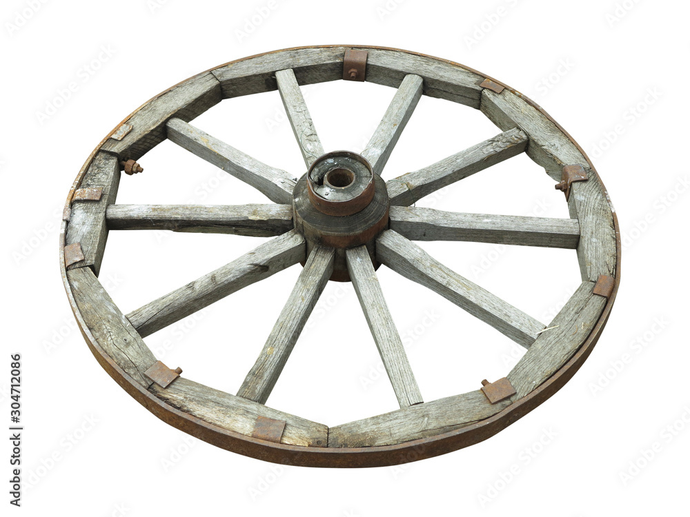 Old brown wooden wagon wheel from a cart isolated over white Old brown wooden wagon wheel from a cart isolated over white