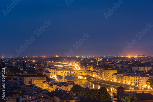 Night view of the old city in Florence over the Ponte Vecchio, Florence, Italy