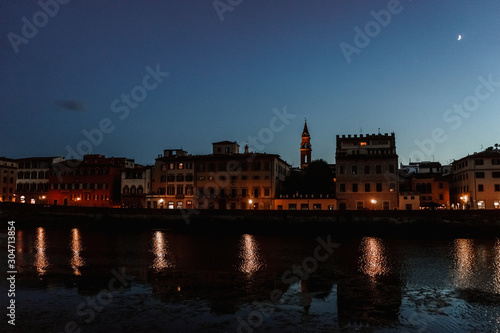 Evening lights of Florence waterfront | FLORENCE, ITALY - 14 SEPTEMBER 2018. 