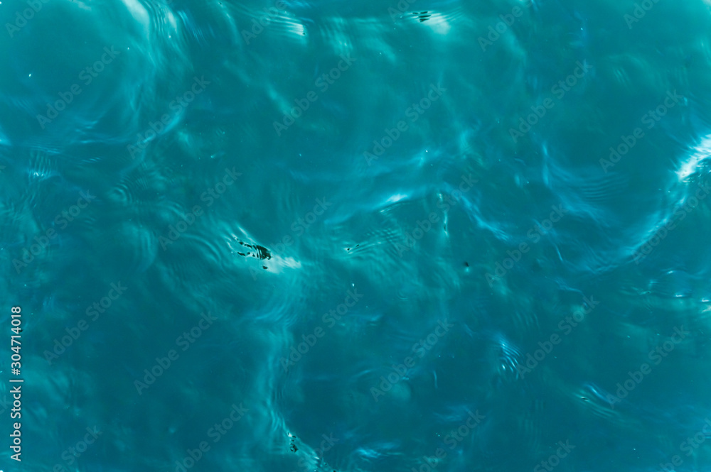 Close up of turquoise sea surface with ripples
