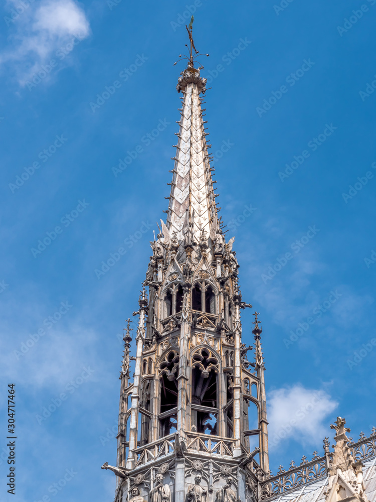 Tower of The Sainte-Chapelle or Holy Chapel,a gothic building full of beautiful stained glass windows in Paris, France Tower of The Sainte-Chapelle or Holy Chapel,a gothic building full of beautiful stained glass windows in Paris, France