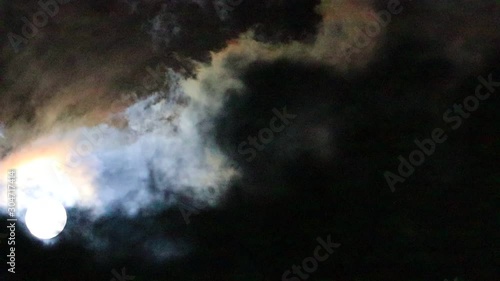 Moon and strange clouds in the night