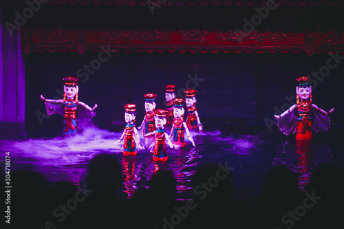 Traditional Vietnamese water puppet dolls theatre show in Hanoi, Vietnam, water puppetry doll show