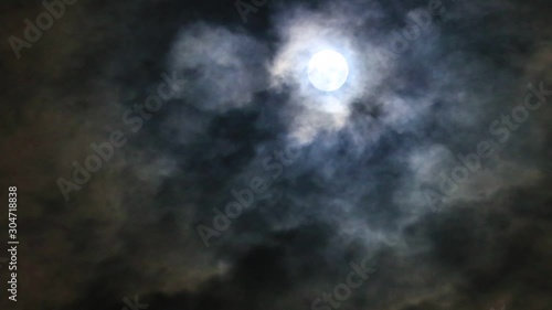 Moon and strange clouds in the night