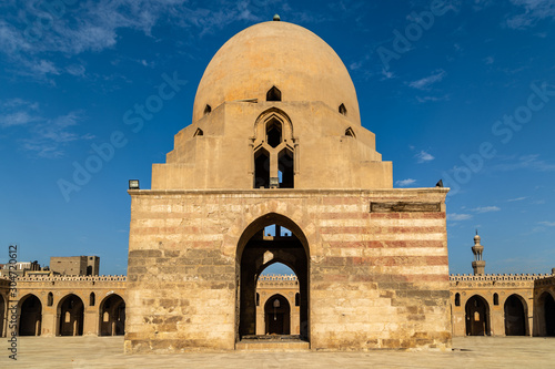 The Mosque of Ahmad Ibn Tulun is located in Cairo, Egypt. It is the oldest mosque in the city surviving in its original form, and is the largest mosque in Cairo in terms of land area photo