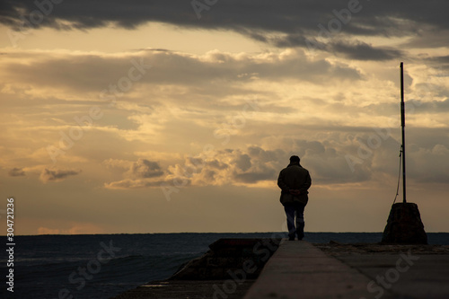 silhouette of a man at sunset