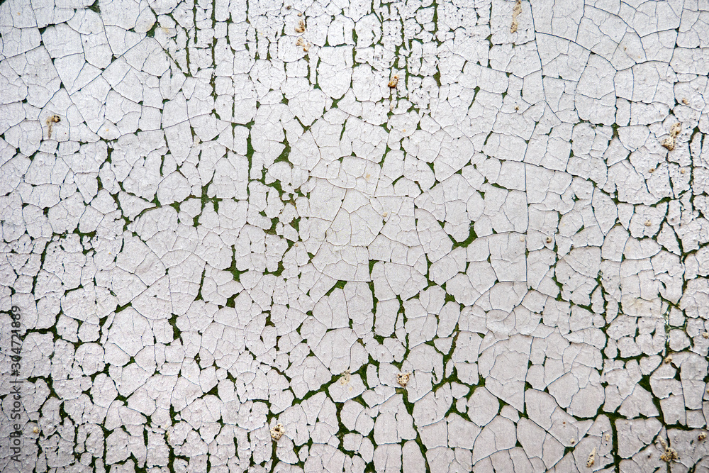 Texture of old peeling metal wall painted with white paint Texture of old peeling metal wall painted with white paint