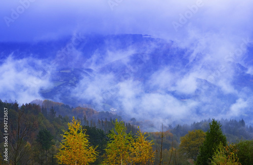 clouds and mists in bad weather in autumn in the forests of the Araitz valley, Navarra