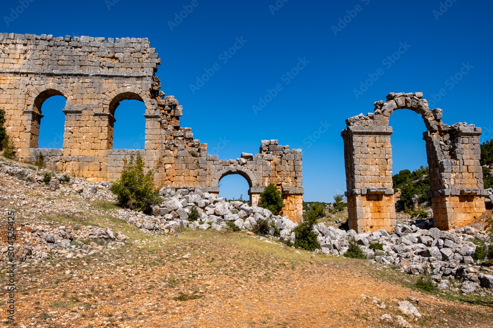 Ruins of ancient city Olba (Uzuncaburc) - Mersin, Turkey. Uzuncaburc, the place of worship of the Olba Kingdom in the Hellenistic Period