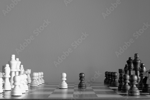 Pawn stand against each other. Chess board game. The battle begin. Black and White for business strategy and competition concept.