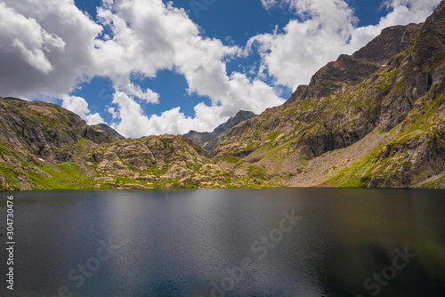 Fototapeta Naklejka Na Ścianę i Meble -  French Alps at an altitude of 2800 meters, Mountain peaks and untouched nature, clear lakes