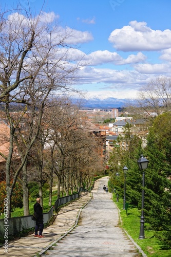 Beautiful panoramic view of the spring Madrid with snow tops of the Guadarrama Mountains 