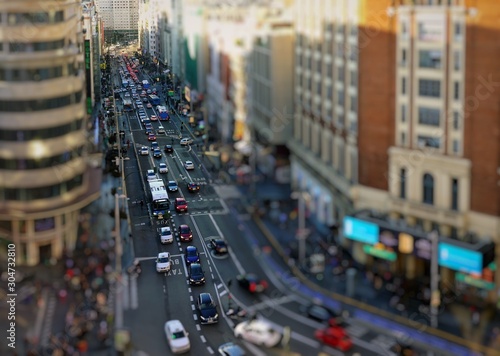 Top view on Gran Via street. Gran Vía (literally "Great Way") is an ornate and upscale shopping street located in central Madrid.
