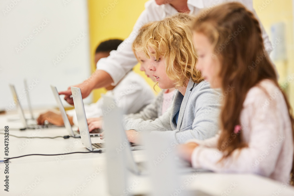 Children learn lessons in the computer Stock Photo | Adobe Stock