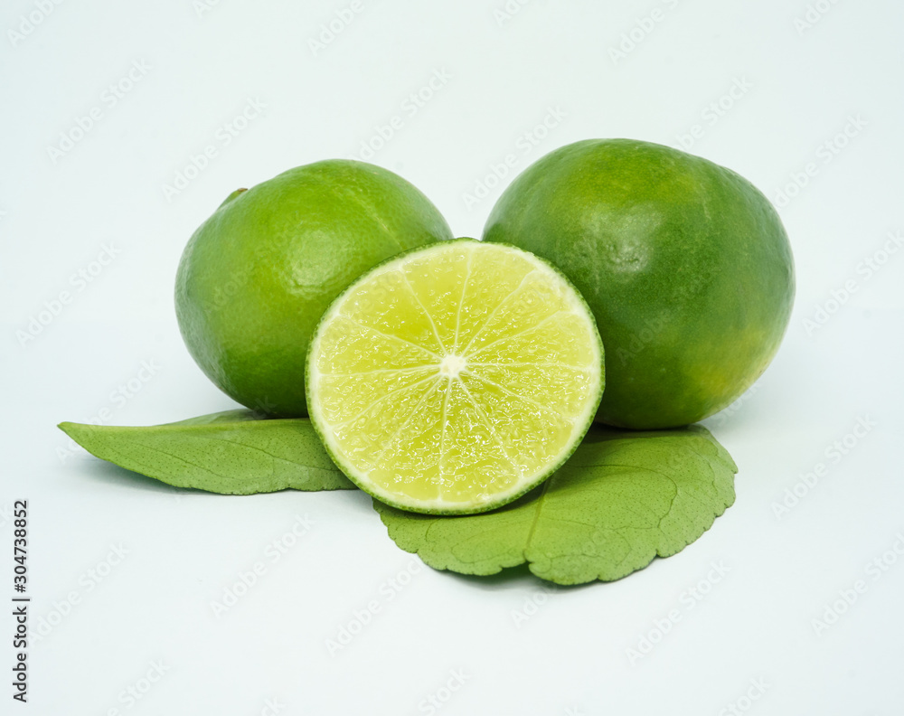 set of green fresh limes slice isolated on white background set of green fresh limes slice isolated on white background
