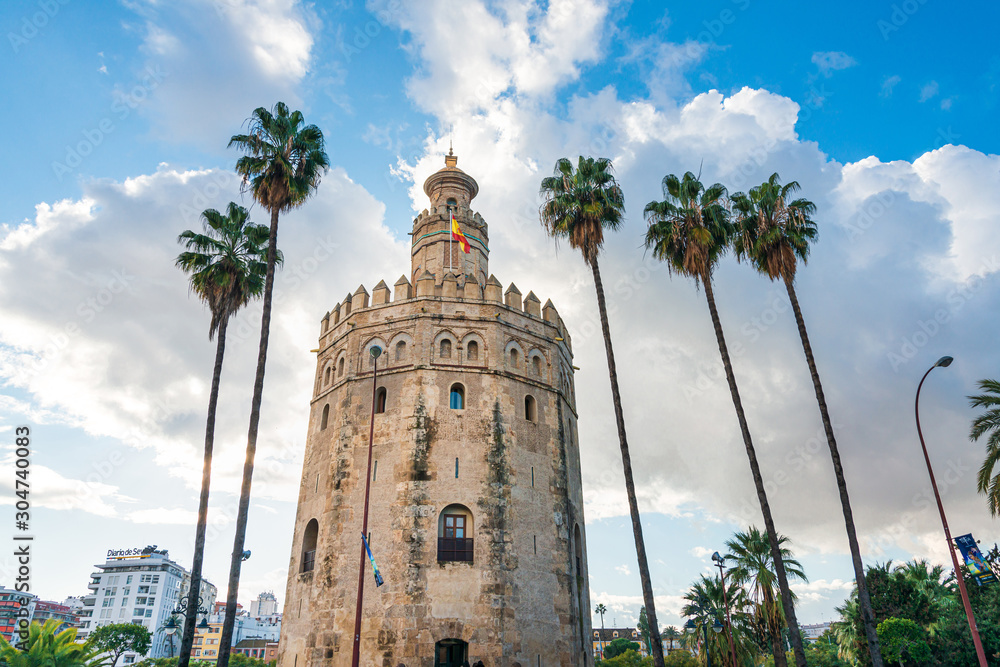 SEVILLA, SPAIN - January 13, 2018: Tower of Gold (Torre del Oro) is a dodecagonal military watchtower in Seville, Spain