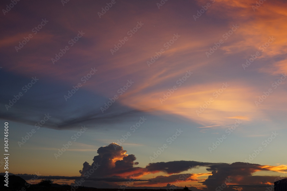 Fototapeta premium Orange Clouds,Sky are like cotton candy.