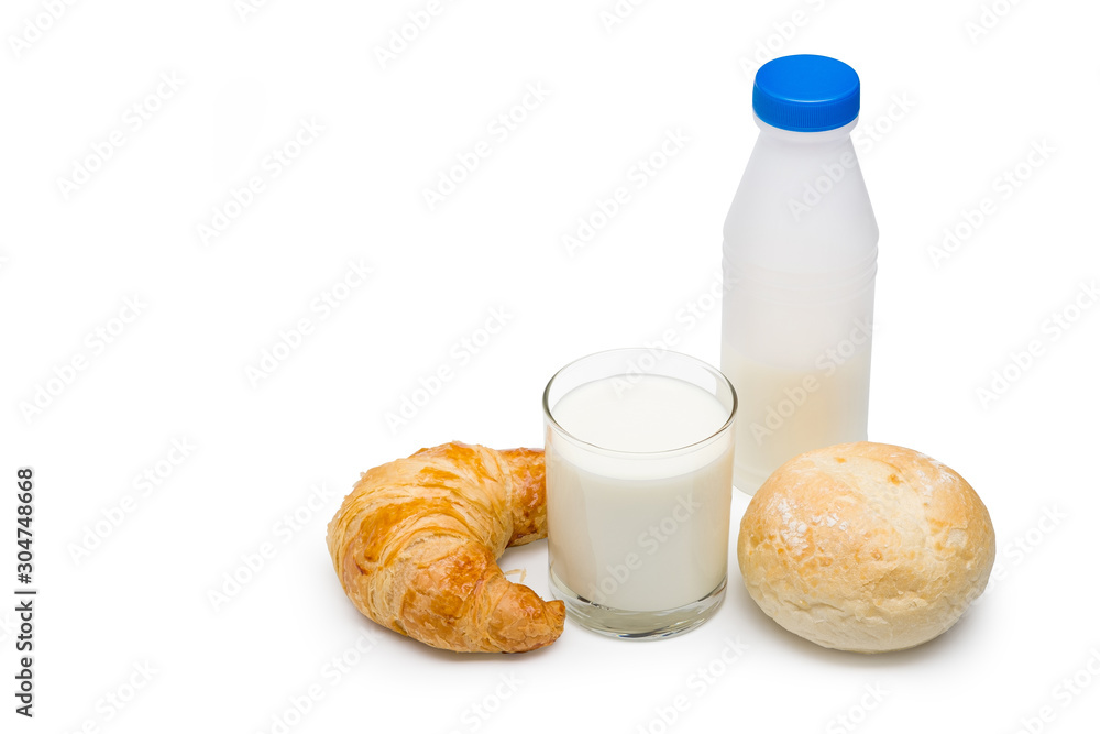 Pasteurized fresh milk in the glass with bread and plastic bottle on white background with clipping path. Pasteurized fresh milk in the glass with bread and plastic bottle on white background with clipping path.