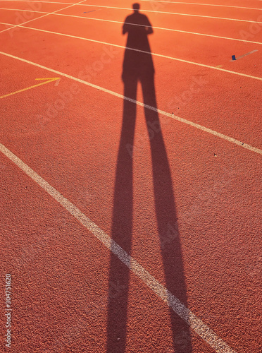 Human silhouette on the track.walking excercise