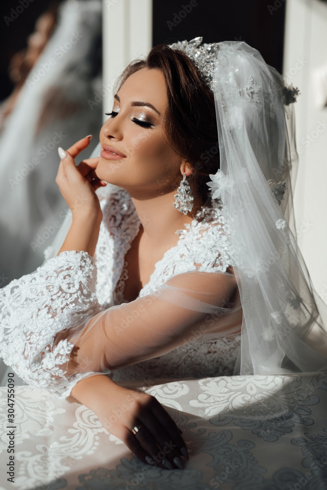 Fashion bride gorgeous beauty, bride woman in robe. Portrait wedding makeup  and hairstyle, girl with veil and jewelry at home. Bride wedding morning.  Face close up. Sensual moment. Stock Photo | Adobe