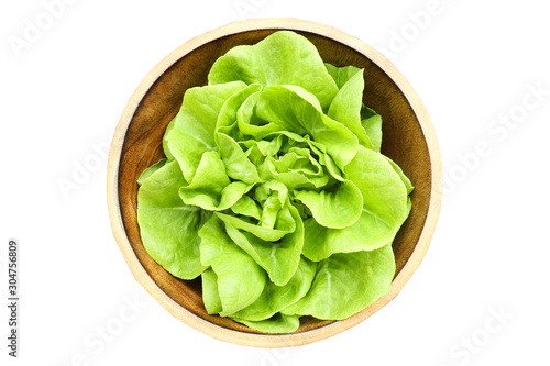 Organic freshness Green Butter leaf head of Lettuces cabbage  iceberg salad vegetable nutrient high vitamin  for cuisine isolated in Wooden bowl  on white background  close up soft focus