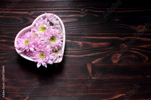 flowers on wooden background