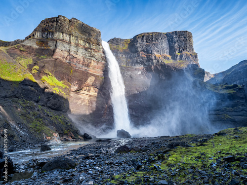 Fototapeta Naklejka Na Ścianę i Meble -  View of the landscape of the Haifoss waterfall in Iceland.  Nature and adventure concept background.