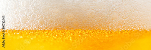 Photo Light Beer with Bubbles and Foam Background