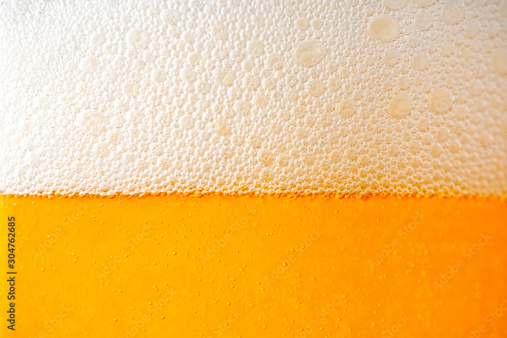 Light Beer with Bubbles and Foam Background. Beer Bubbles Texture Close Up Light Beer with Bubbles and Foam Background. Beer Bubbles Texture Close Up