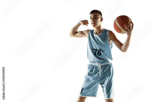 Full length portrait of young basketball player with a ball isolated on white studio background. Teenager celebrating winning. Concept of sport, movement, healthy lifestyle, ad, action, motion. © master1305