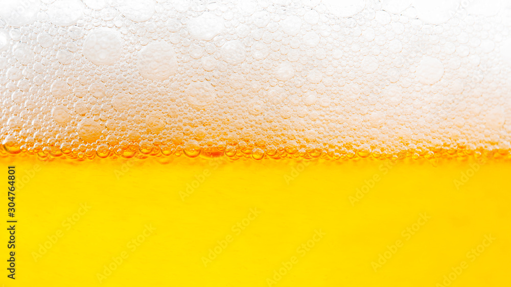 Light Beer with Bubbles and Foam Background. Beer Bubbles Texture Close Up Light Beer with Bubbles and Foam Background. Beer Bubbles Texture Close Up