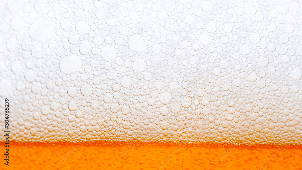 Light Beer with Bubbles and Foam Background. Beer Bubbles Texture Close Up Light Beer with Bubbles and Foam Background. Beer Bubbles Texture Close Up