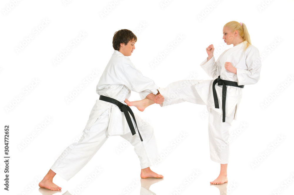 Cute blonde girl and a young cheeky guy karate Cute blonde girl and a young cheeky guy karate