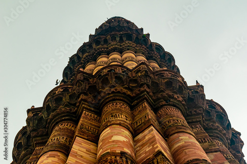 Calligraphy on Qutub Minar, Delhi, India photo