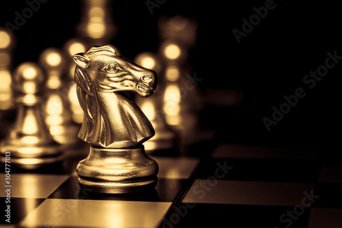 Gold luxury Elegant Chess horse piece with black space for text. Successful Business leader concept.