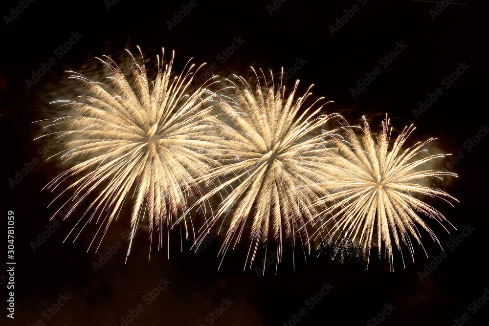 Amazing golden fireworks on dark background Amazing golden fireworks on dark background