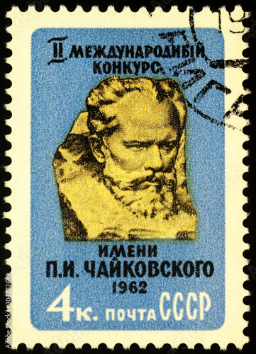 Sculpture of Russian composer Pyotr Tchaikovsky on postage stamp photo