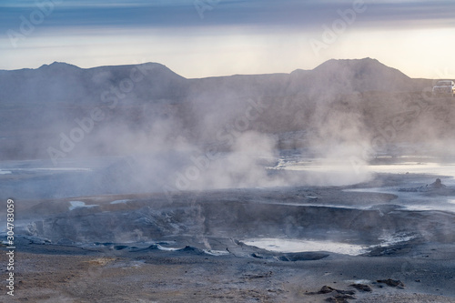 steaming mud holes and solfataras in the geothermal area of Hverir near lake Myvatn, northern Iceland