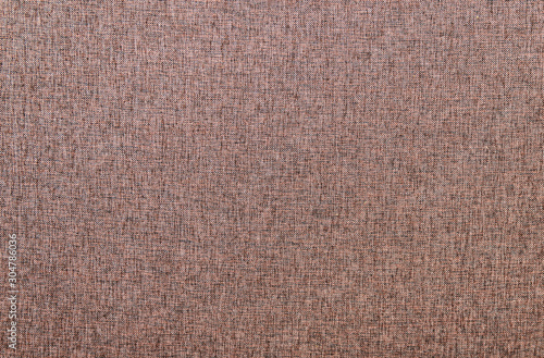 Background from a rough dark brown fabric for upholstery