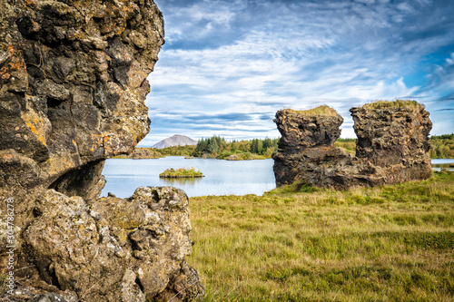 tranquil landscape with solitary lava monoliths at Lake Myvatn in northern Iceland