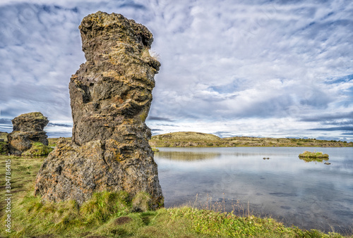 tranquil landscape with solitary lava monoliths at Lake Myvatn in northern Iceland