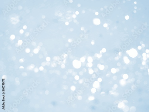 Blue background with abstract bokeh. Winter lights. 