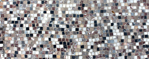 Mosaic of black and white tiles