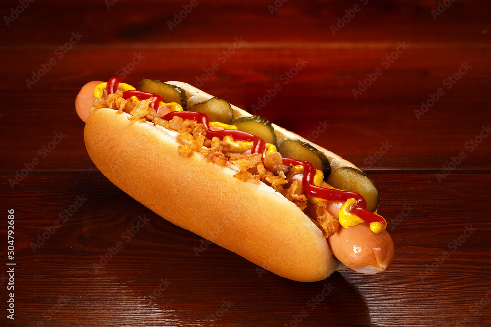 Premium Photo  A hot dog with onions and mustard on it