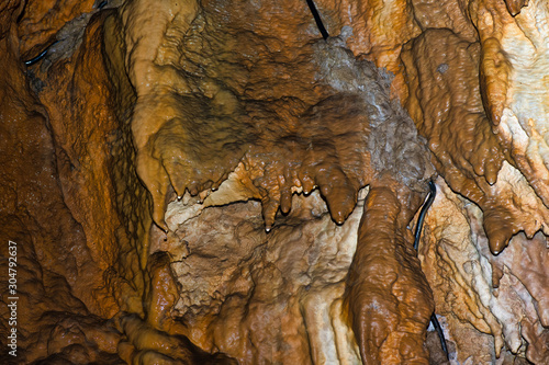 Inside a limestone cave during a speleological tourist visit