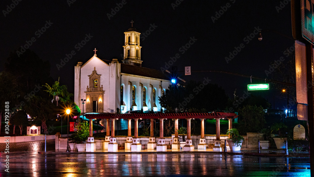 Church belltower at night in the rain