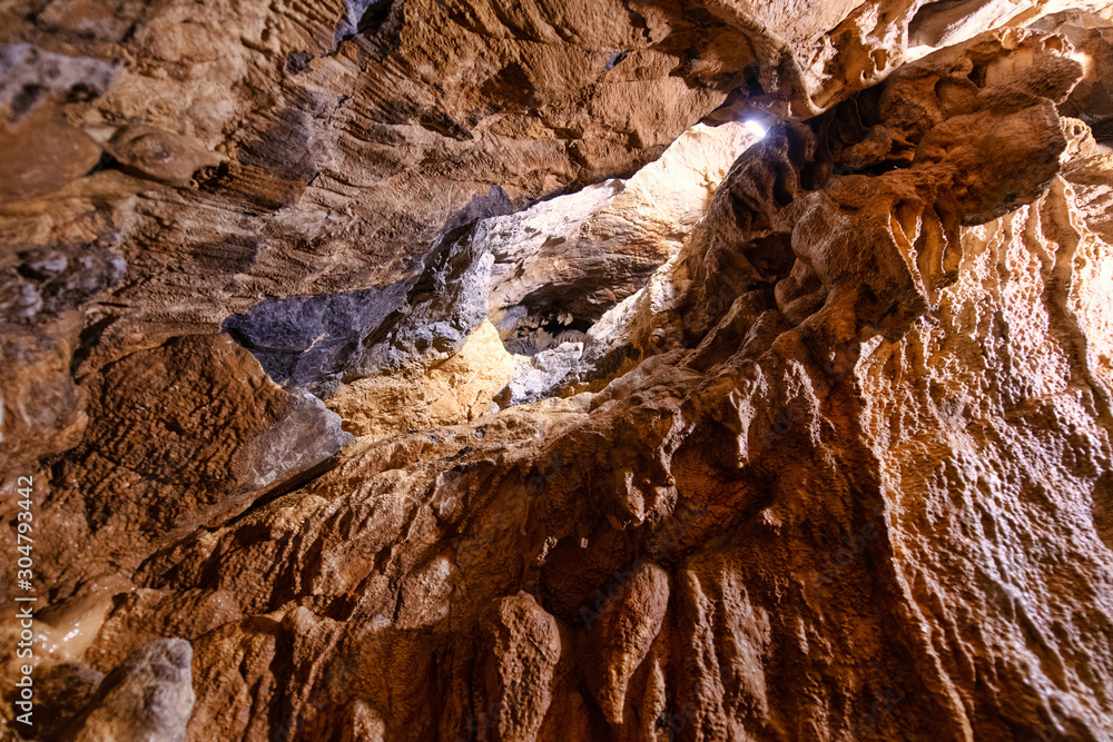 Limestone in underground caves frequented by speleologists Limestone in underground caves frequented by speleologists